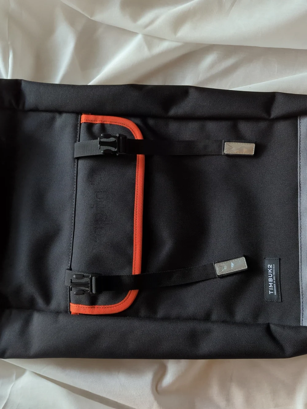 Timbuk2 Black Backpack with Orange Trim and Gray Base